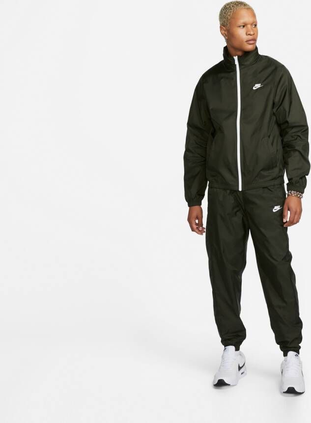 Nike Sportswear Club Geweven trainingspak met voering voor heren Groen