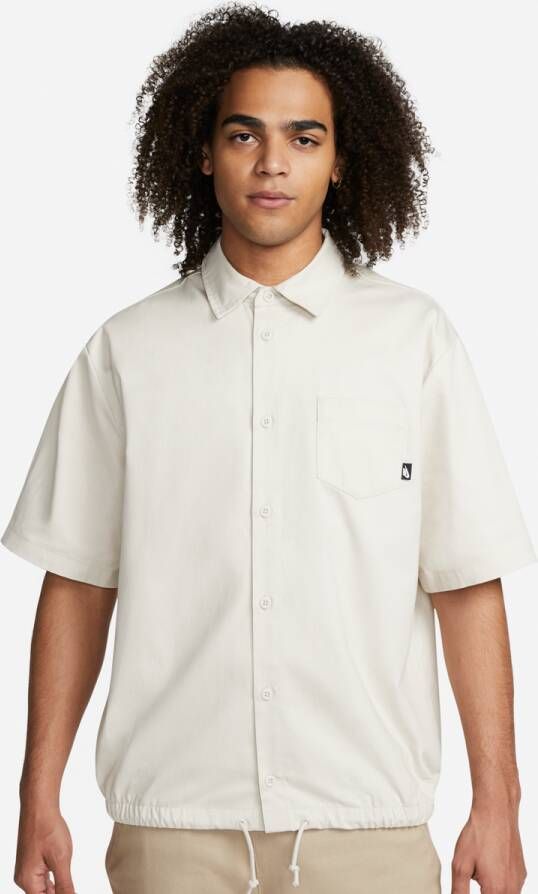 Nike Club Herentop met korte mouwen en knoopsluiting Bruin