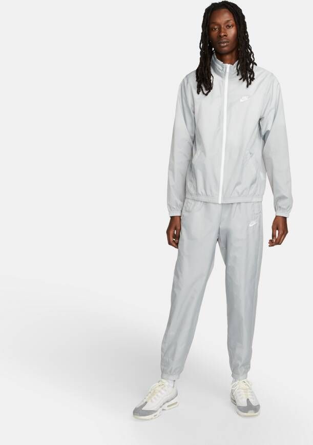Nike Sportswear Club Geweven trainingspak met voering voor heren Grijs