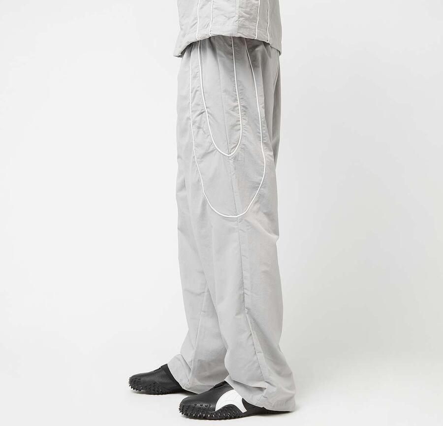 Puma tech-X Relaxed Track Pant Woven Men Trainingsbroeken grijs Maat XL Kleding