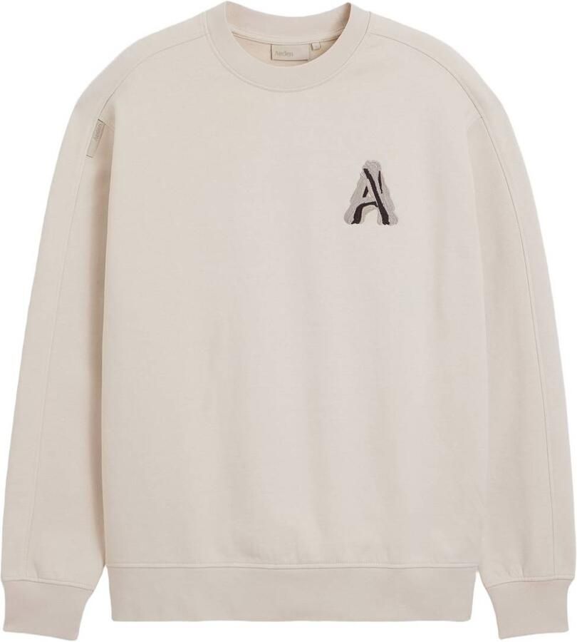 Aeden oversized trui met borduursels en backprint beige