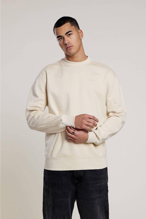 Aeden sweater met backprint beige