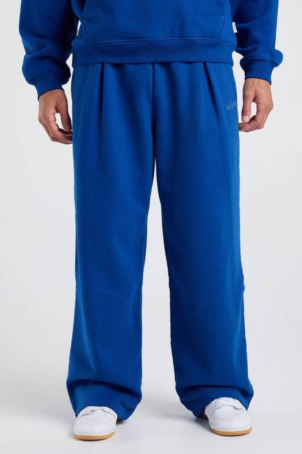 America Today loose fit joggingbroek met borduursels en plooien kobalt