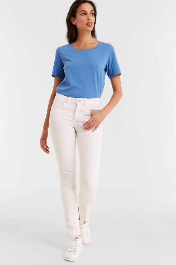 Anytime mid rise skinny jeans white