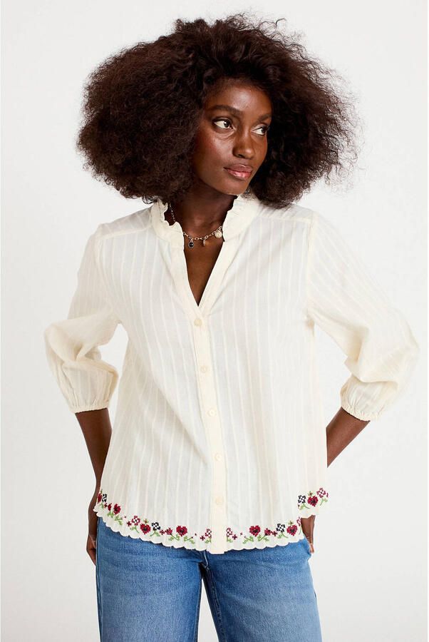 Cache blouse met borduursels ecru