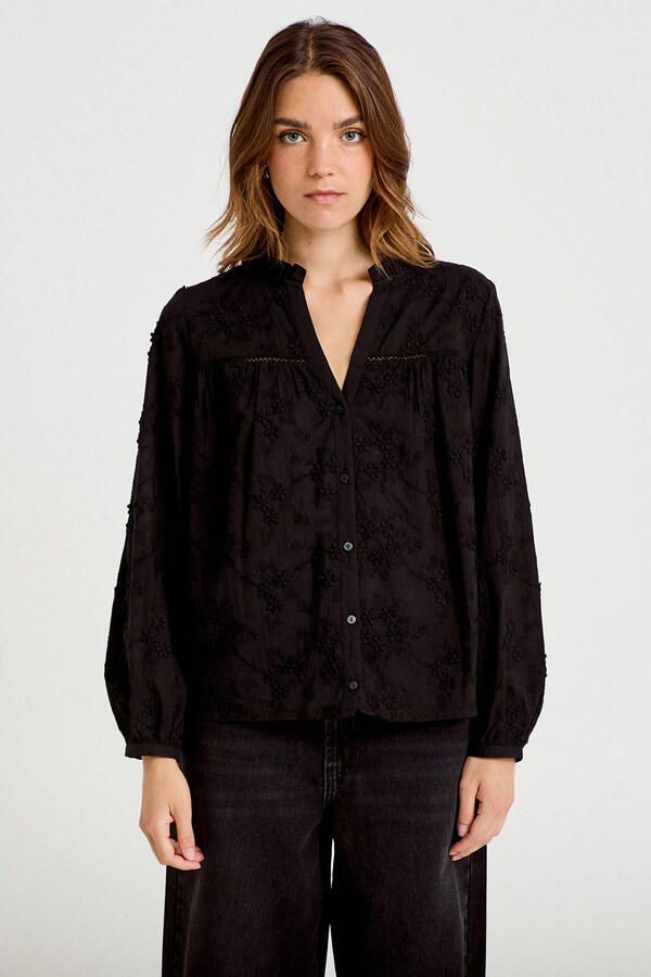 Cache blouse met borduursels zwart