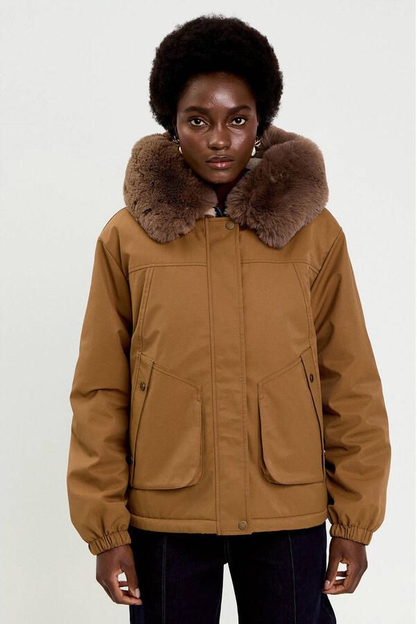 Cache faux fur jas bruin
