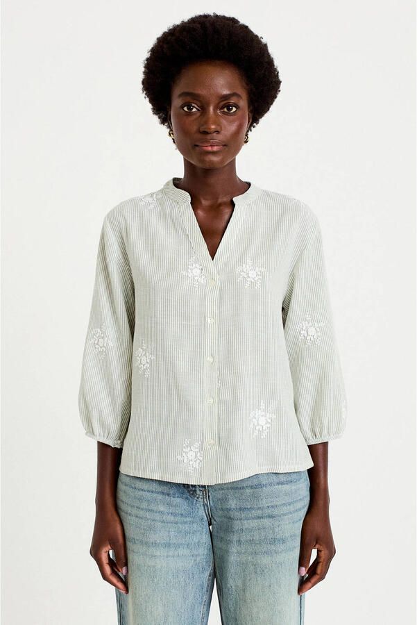 Cache gestreepte blouse groen