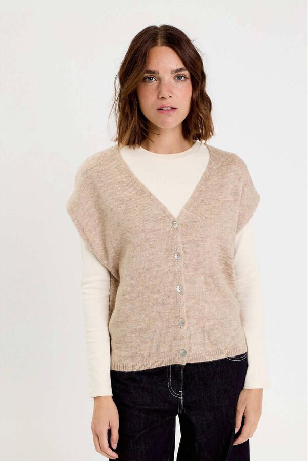 Cache gilet beige