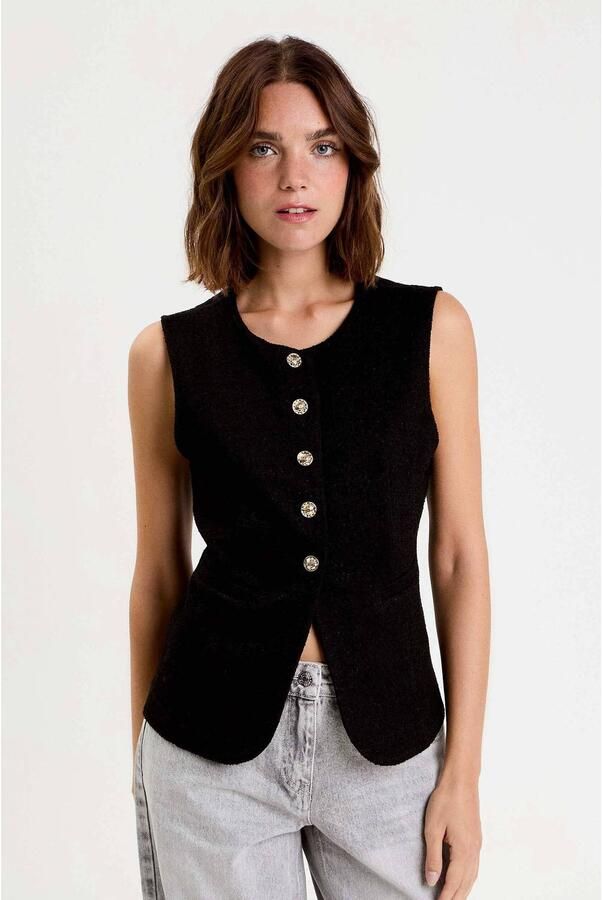 Cache gilet zwart