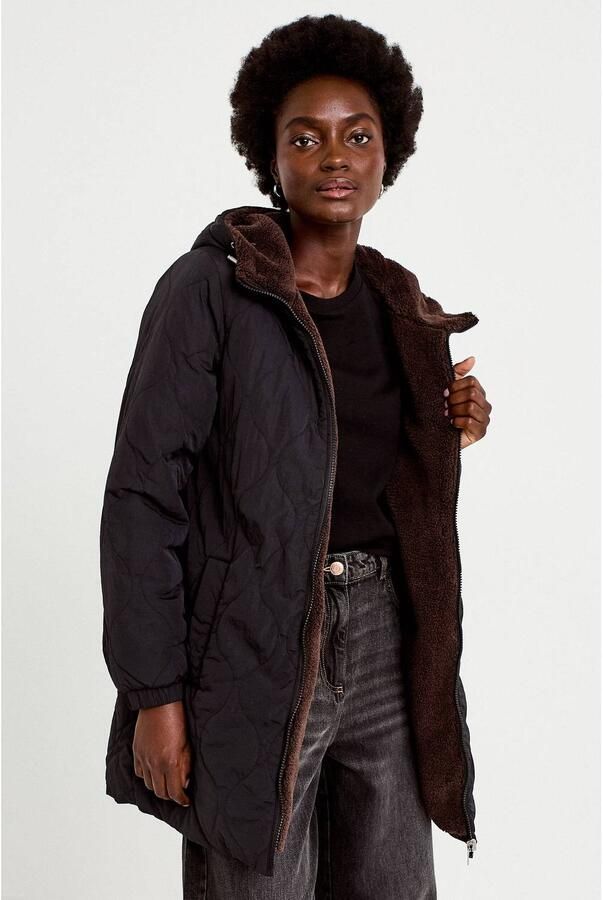 Cache reversible jas met teddy details zwart