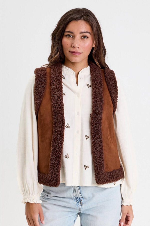 Cache teddy gilet