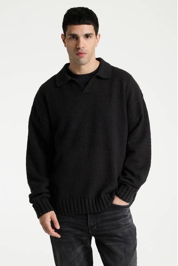 CHASIN' bouclé relaxed fit gebreide trui jet black
