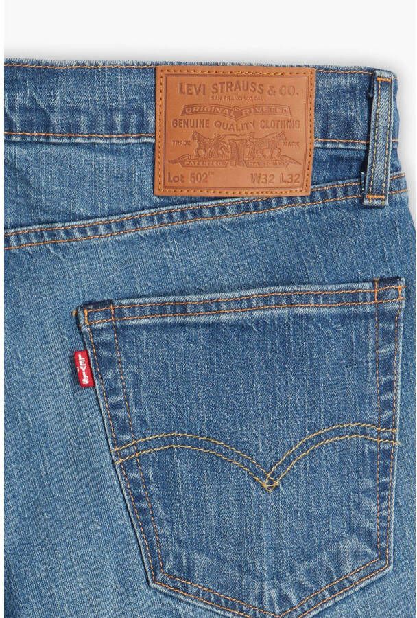 Levi's 502 tapered fit jeans here for a while