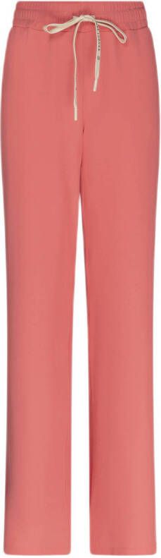 Jane Lushka flared broek Carola van gerecycled polyester roze