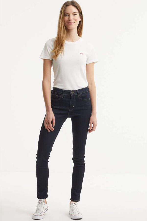 Levi's 711 skinny jeans to the nine
