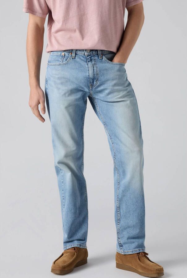 Levi's 505 regular fit straight leg jeans hole in the wall