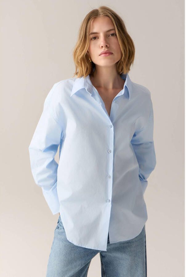 Lois blouse met logo lichtblauw