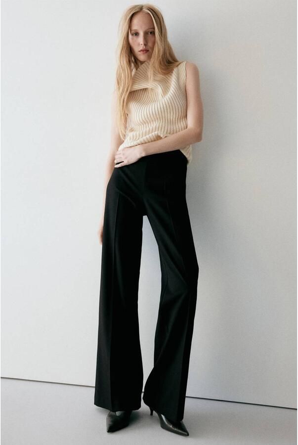Mango flared broek zwart - Foto 3