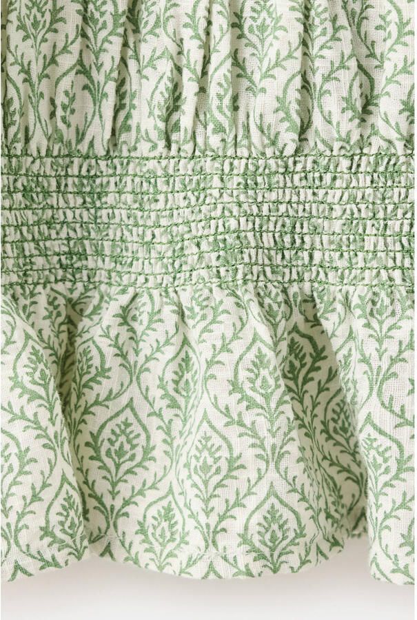 Mango Kids mouwloze blousetop met plooien smockwerk en print groen - Foto 2