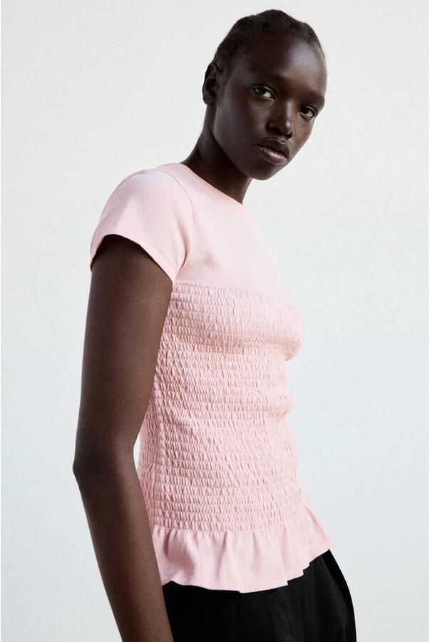 Mango top met peplum en smockwerk roze