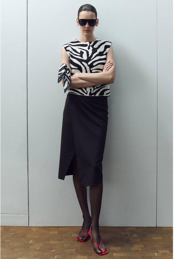 Mango top met zebraprint fijn gebreid zwart