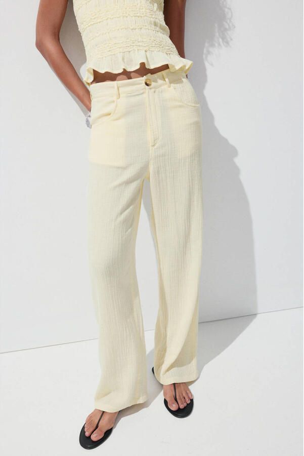 Mango wide leg broek lichtgeel