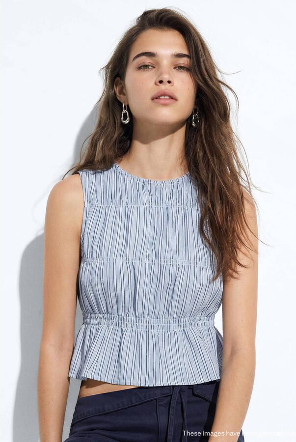 MANGO TEEN gestreepte top met peplum en smockwerk lichtblauw