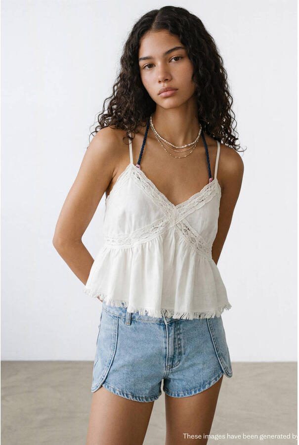 MANGO TEEN mouwloze top wit