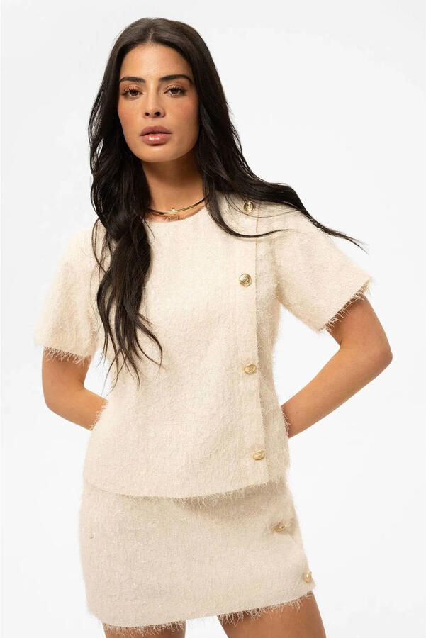 NIKKIE cropped top ecru met textuur