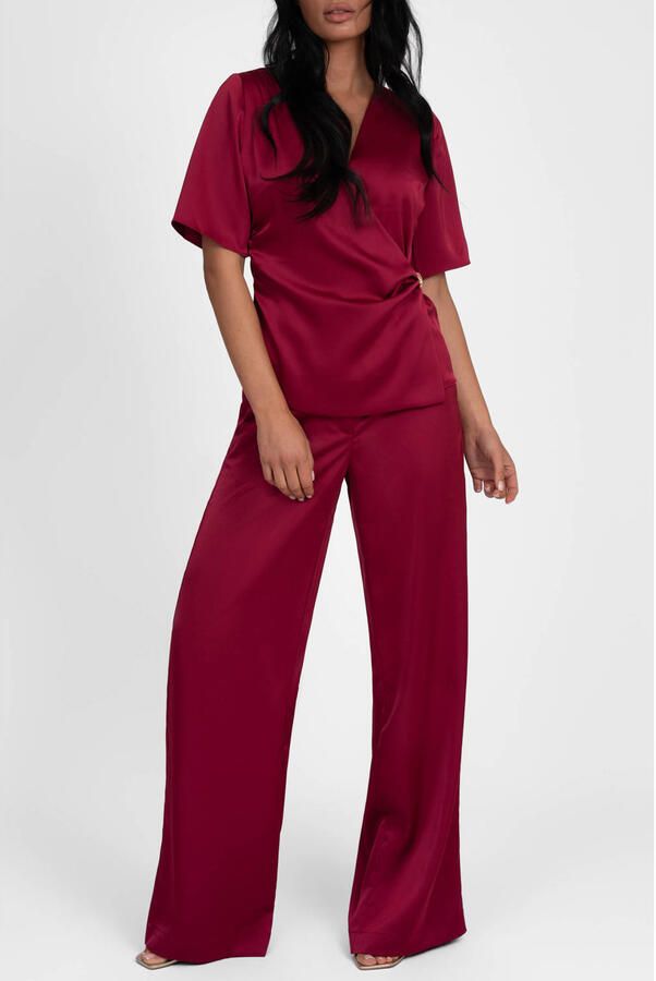 NIKKIE satijnen wide leg broek donkerrood
