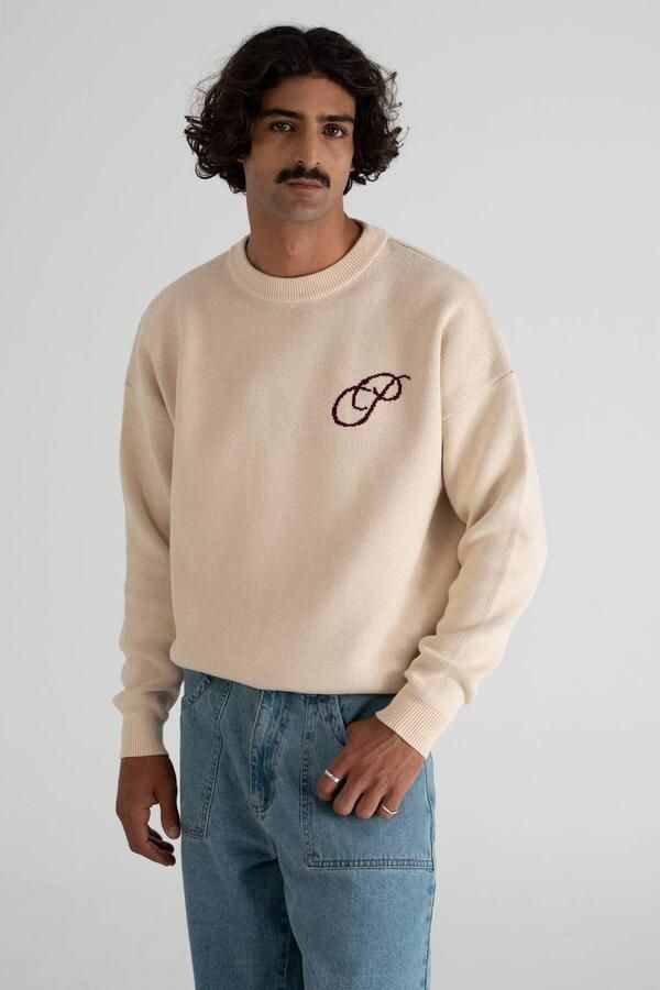 Prohibited katoenen oversized gebreide trui met logo cream