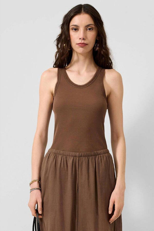 QS singlet bruin