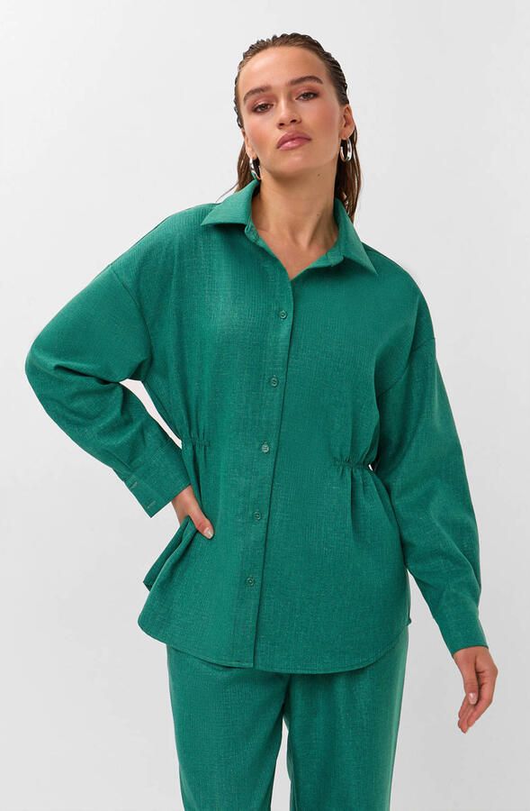 Studio AMAYA getailleerde gemêleerde blouse groen