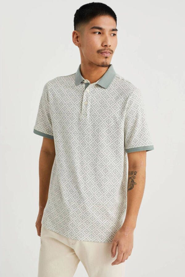 WE Fashion slim fit polo met all over print waterfall