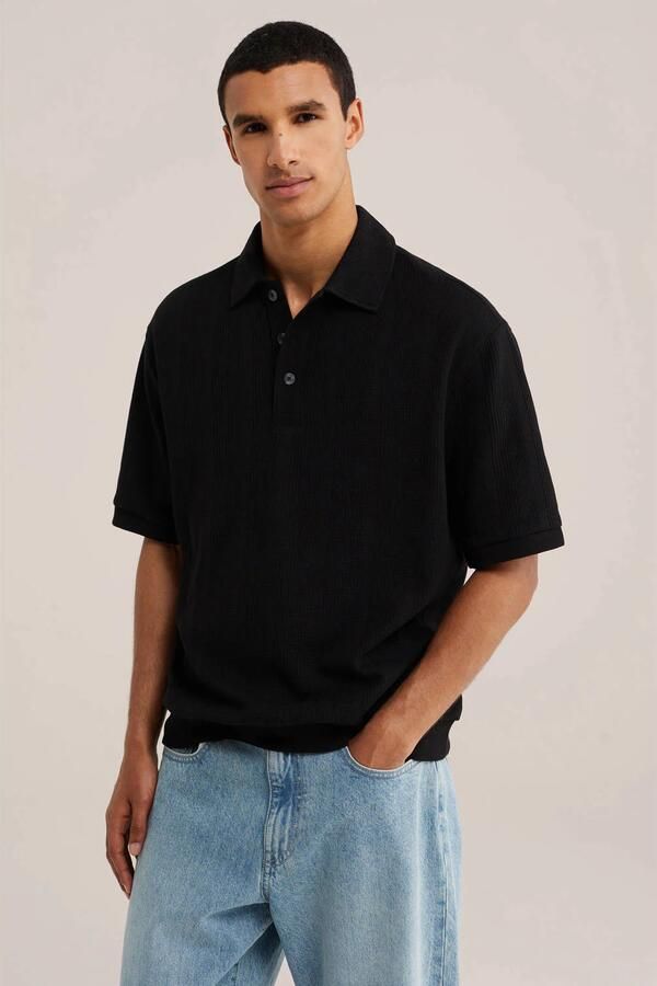 WE Fashion boxy gebreide polo zwart