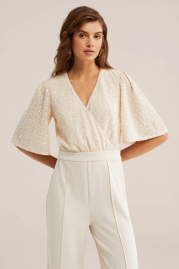 WE Fashion jumpsuit ecru met pailletten