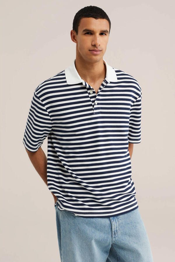 WE Fashion relaxed fit gestreepte polo donkerblauw