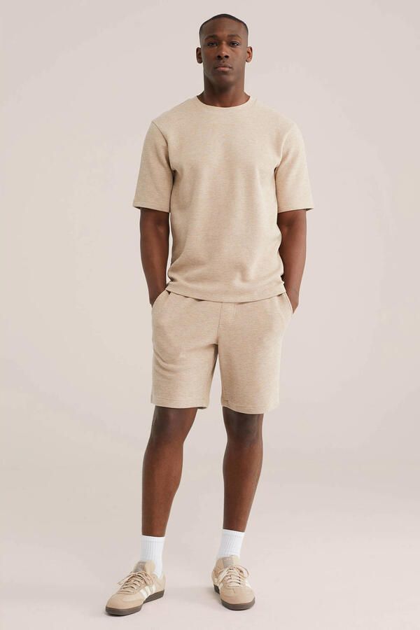 WE Fashion relaxed T-shirt met textuur beige