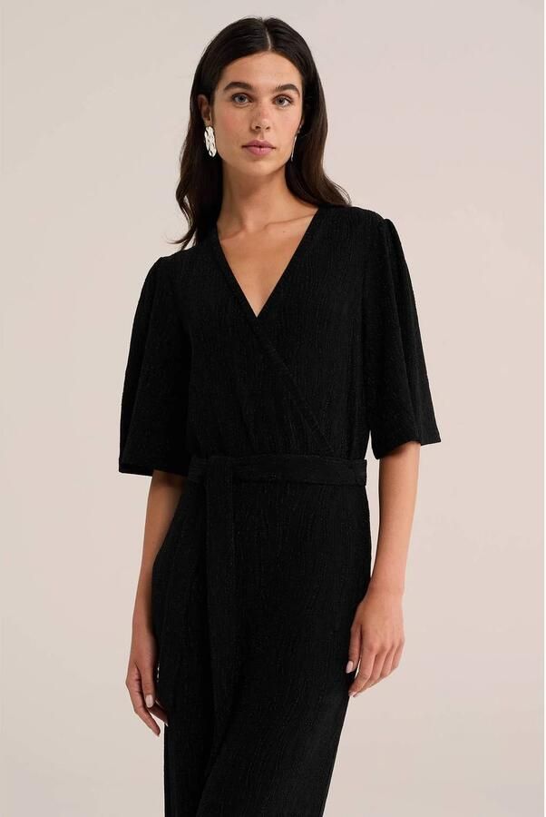 WE Fashion straight leg jumpsuit met glitters zwart